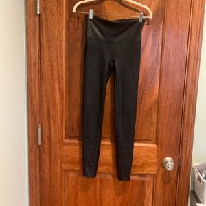 Spanx medium sized tights with a pleather look.